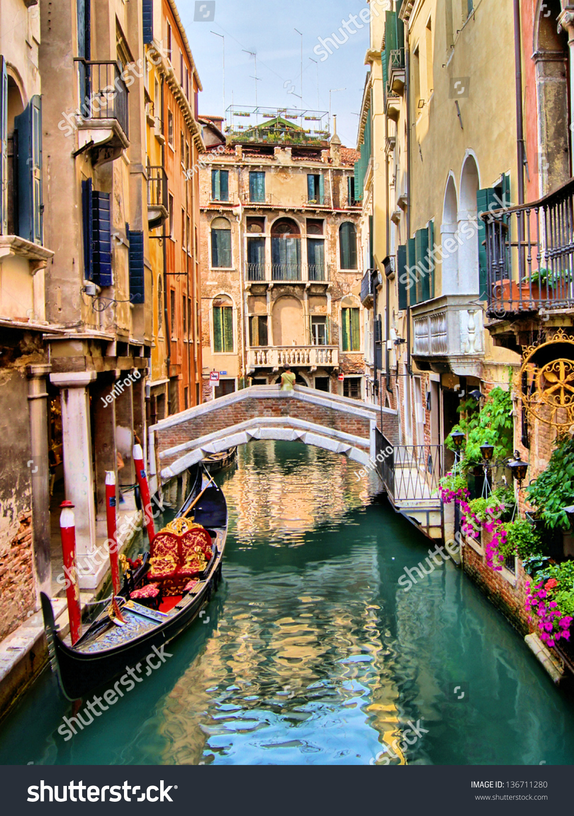 Scenic canal with gondola, Venice, Italy #136711280