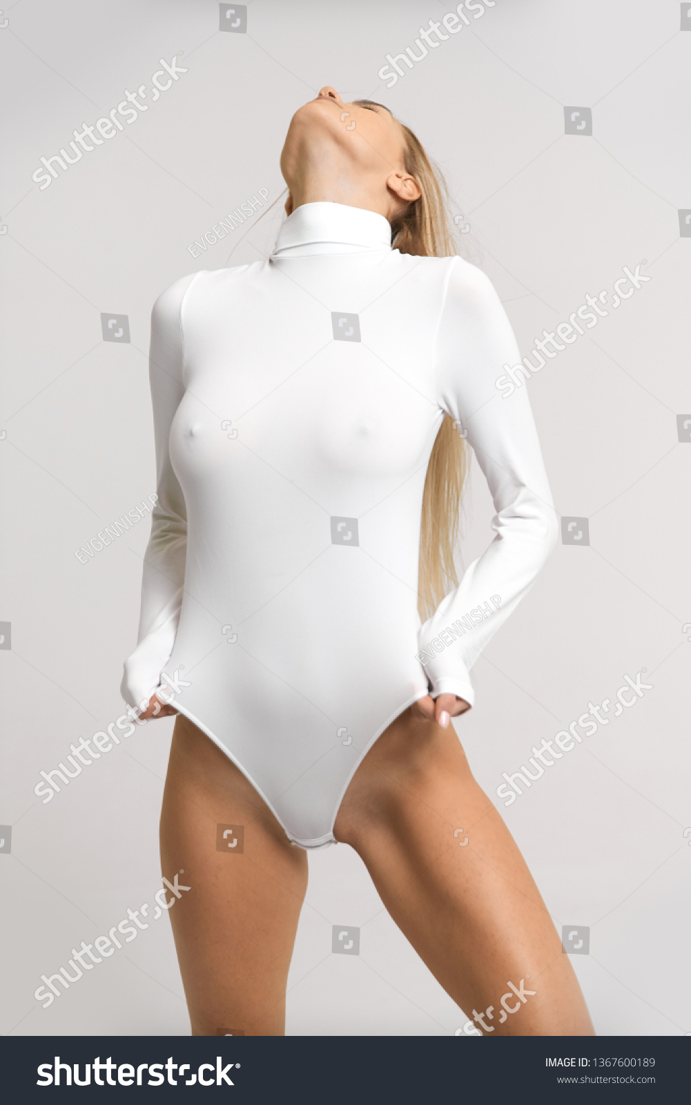 Pretty sexy girl posing in bodysuit with very fashion style, good for advertise and kind of sport goods #1367600189