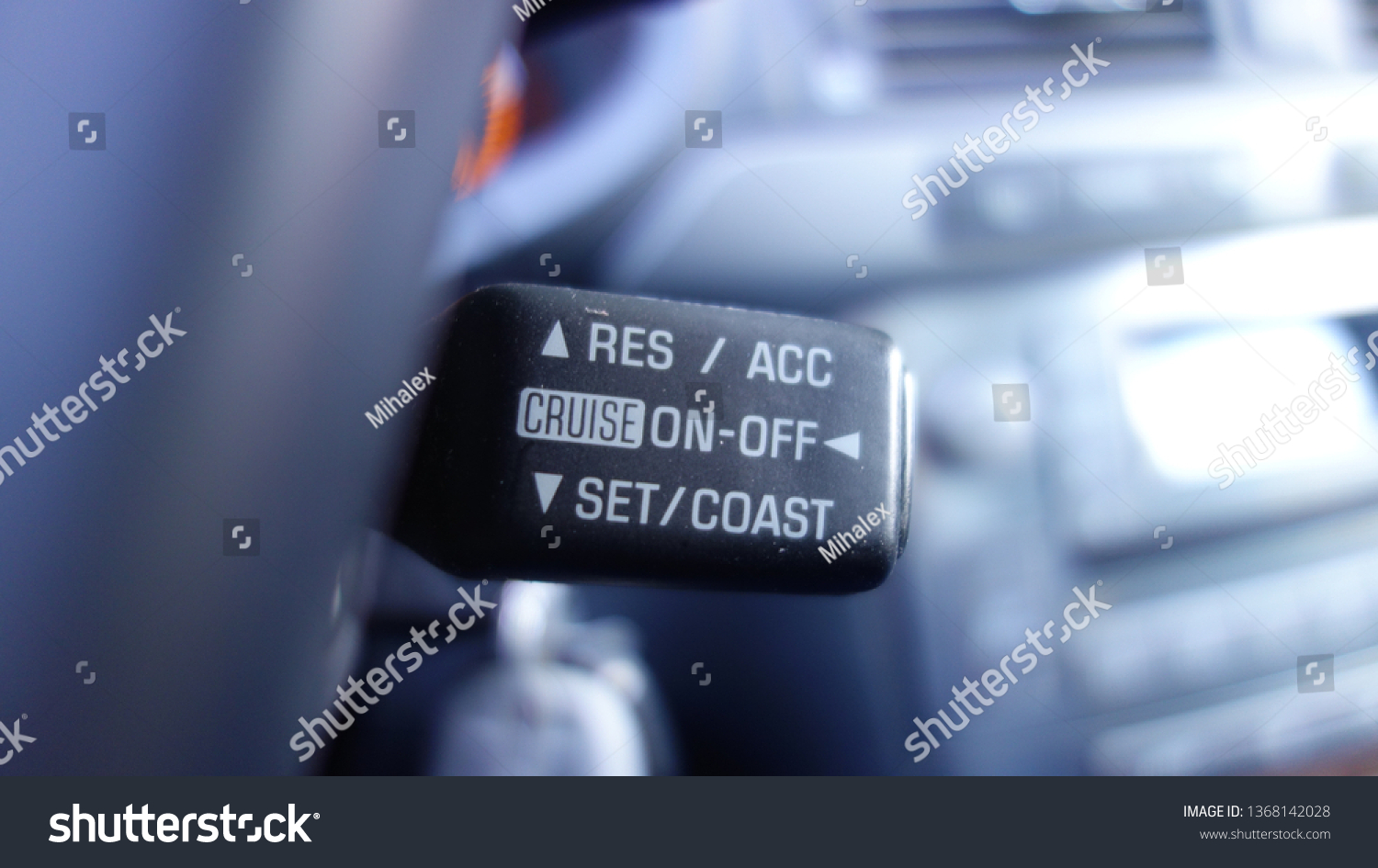 Car details-cruise control switch on the back of the steering wheel with res/acc/cruise/on/off/set/coast commands.  #1368142028