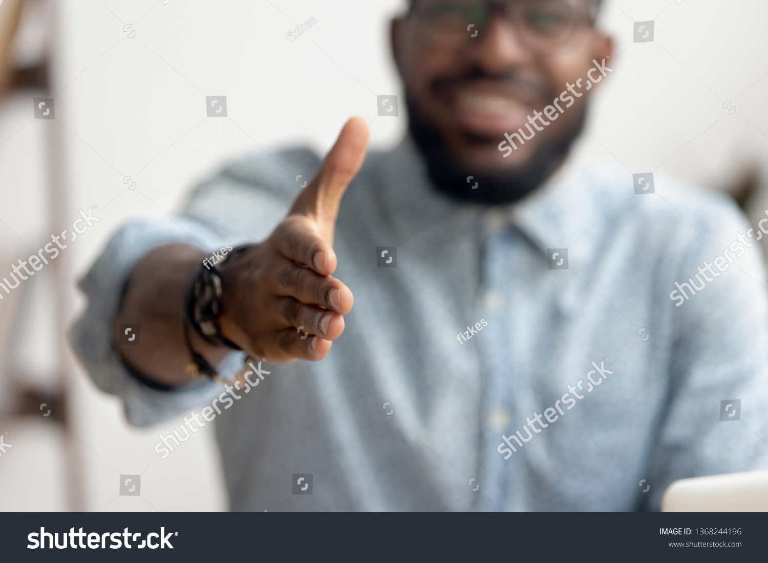 African american black professional business man hr recruiter consultant extending hand at camera for handshake concept greeting offering cooperation, welcoming at job interview, close up view #1368244196