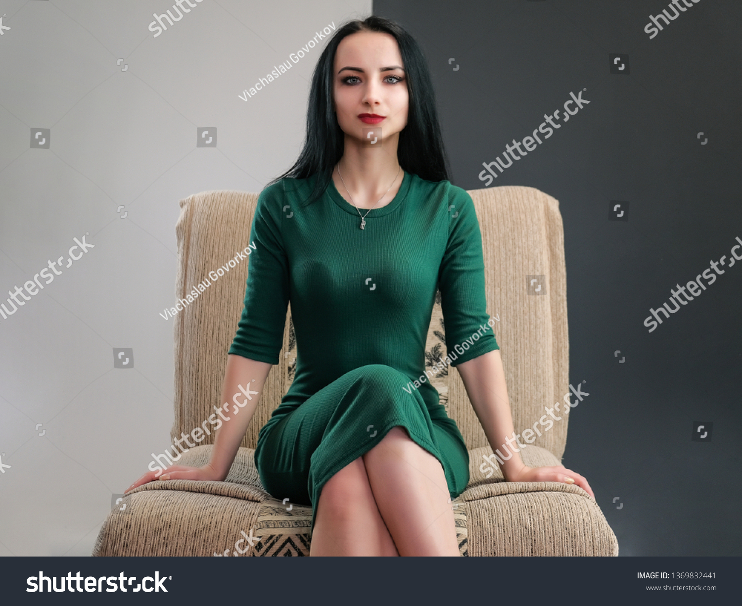 Concept Beauty sexy fashion model woman portrait, with long beautiful hair on multicolored background sitting on a sofa. Beautiful young brunette girl posing in studio. Perfect female make-up. #1369832441