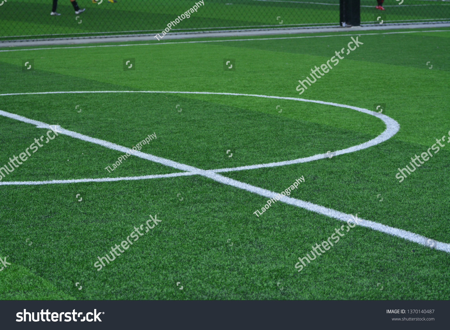 Stadium of football or soccer field with green grass. Sport indoor #1370140487