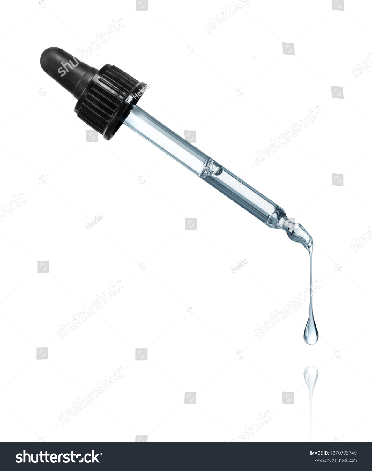 Thick drop is dripping down from cosmetic pipette on a white background #1370793749