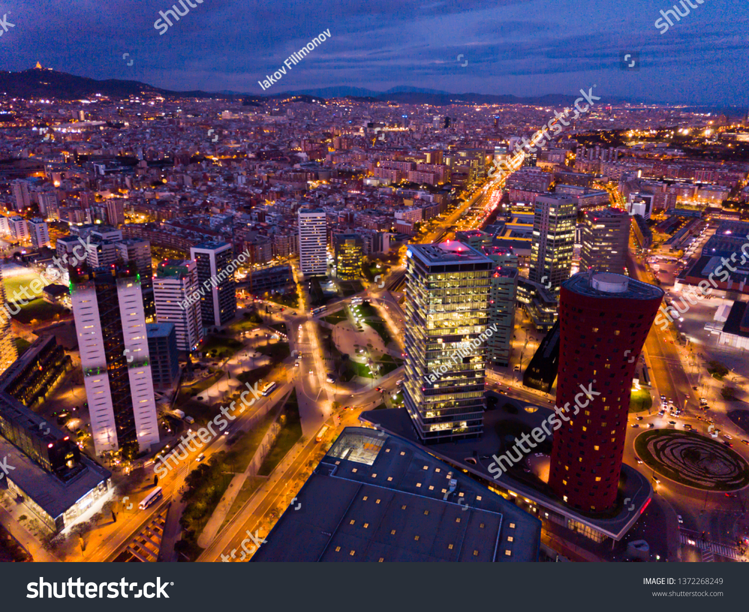 Panoramic view from drone of night Barcelona. Plaza de Europa with Fira Barcelona Gran Via conference center #1372268249