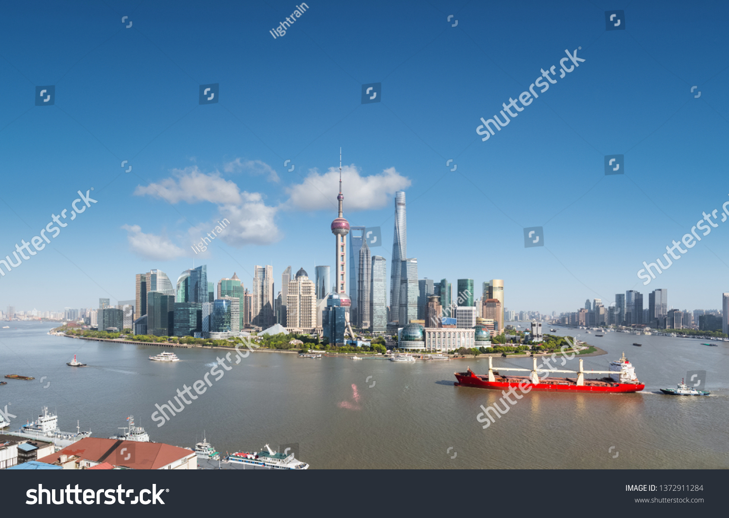 shanghai skyline and cityscape, large ship on the beautiful huangpu river #1372911284