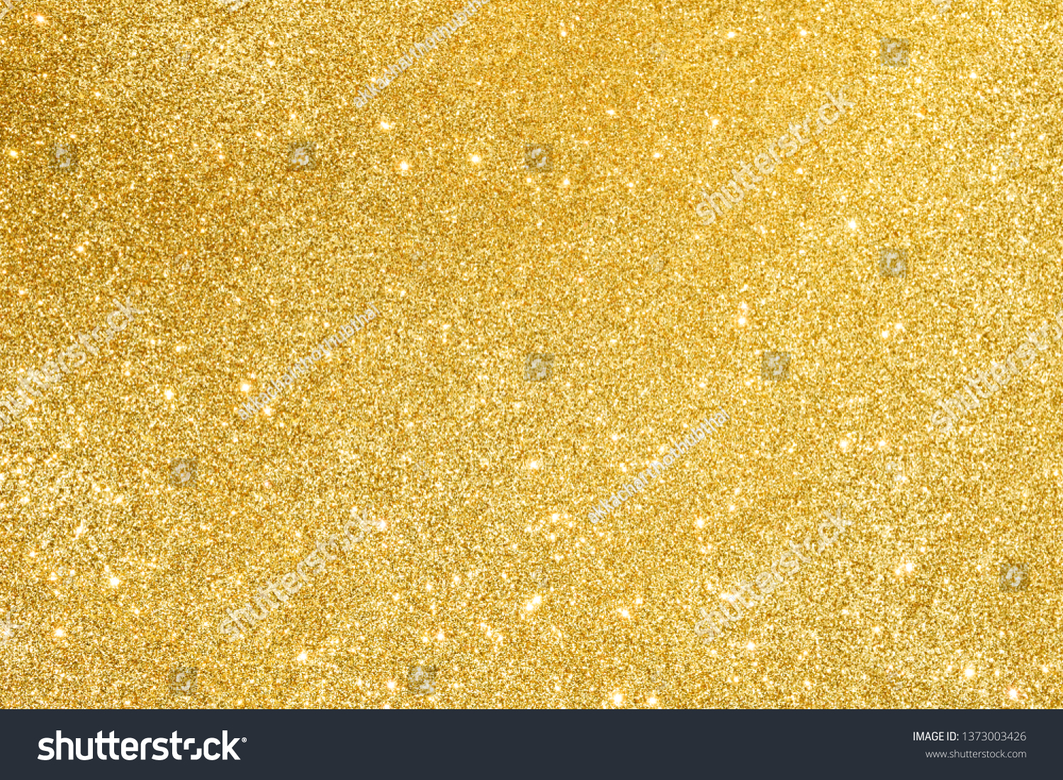 sparkles of golden glitter abstract background #1373003426