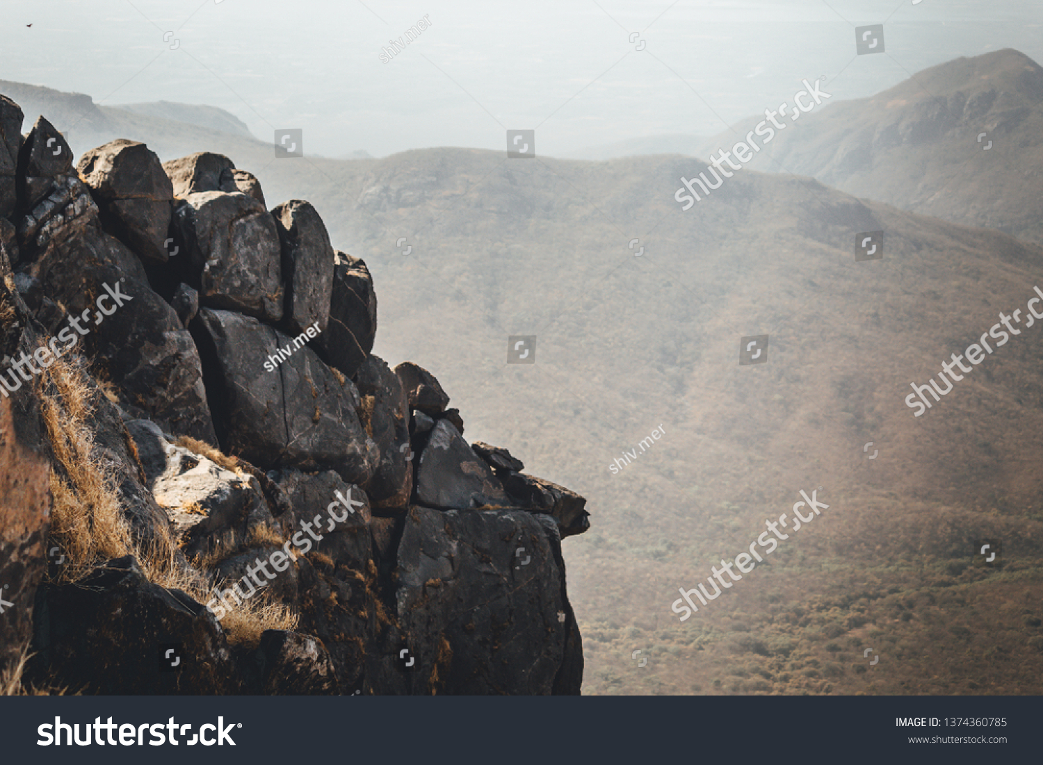View of the scenic mountains as observed from the top of the Girnar mountain at Junagadh, Gujarat, India #1374360785