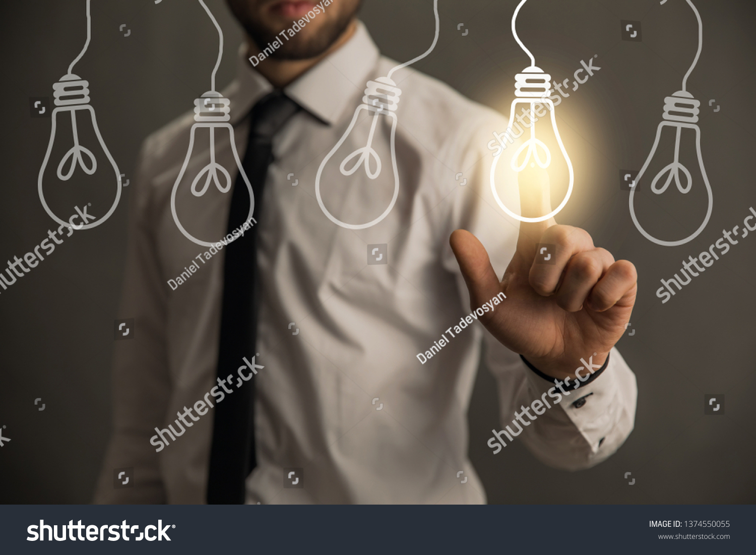 man touching in light bulb in screen
 #1374550055