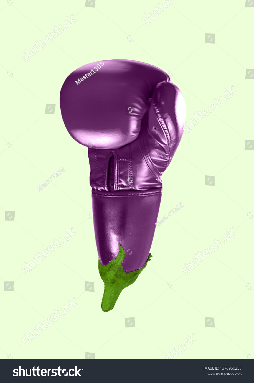 An alternative sport or hematoma. A boxing glove as an eggplant on green background. Negative space to insert your text. Modern design. Contemporary art collage. Concept of food, movement, plants. #1376960258