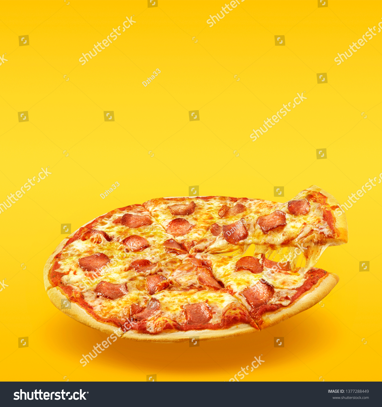 Creative layout of hot delicious pizza in flying on summer orange background. Pizza pepperoni design mockup flyer or poster for promotions and discounts with copy space. Fast Food concept. #1377288449