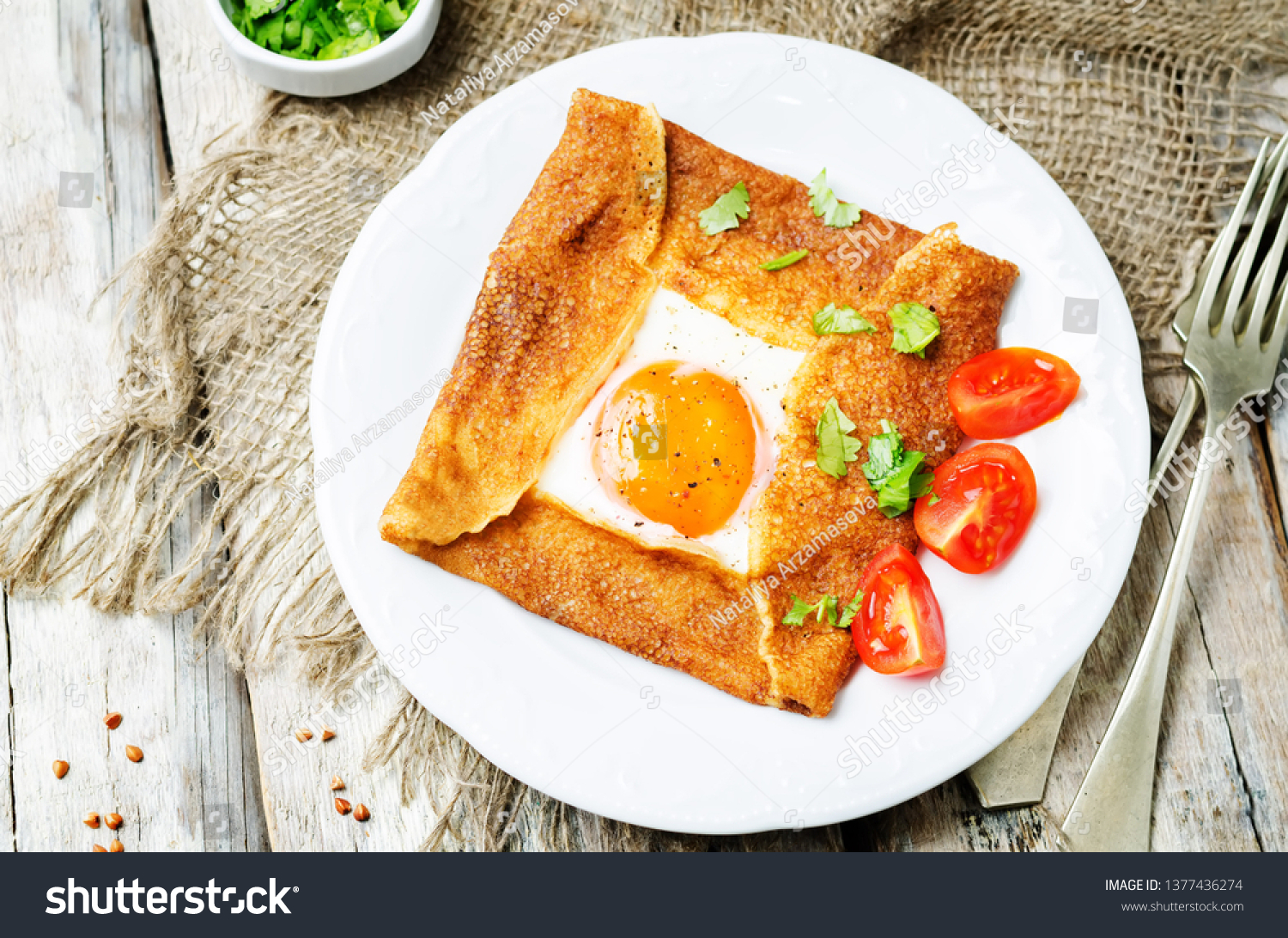 Buckwheat crepes with cheese and egg. toning. selective focus #1377436274