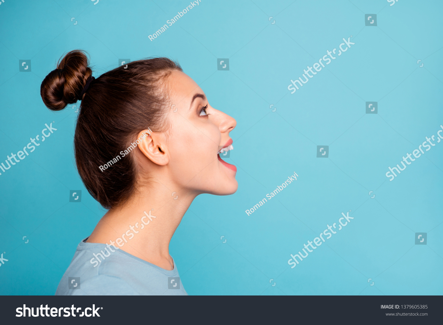 Profile side view photo of pretty youngster glad content enjoy shout news open mouth look up ads wear modern millennial pullover beautiful spring isolated on blue background #1379605385
