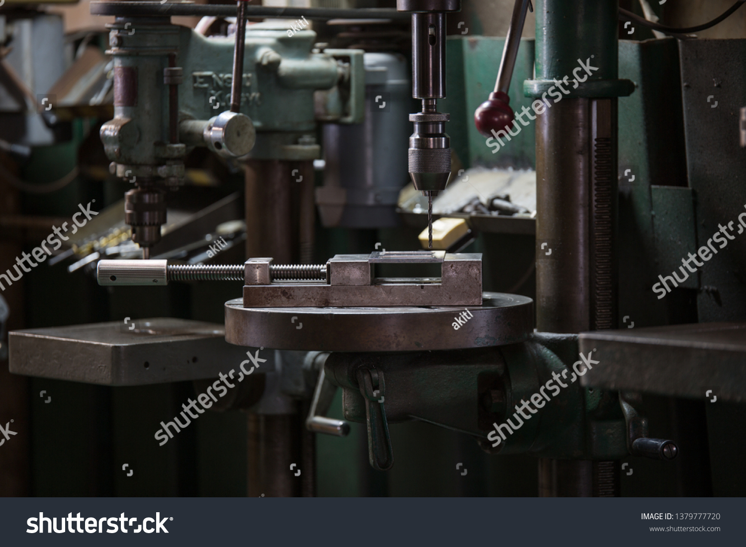 Part machining with drilling machine #1379777720