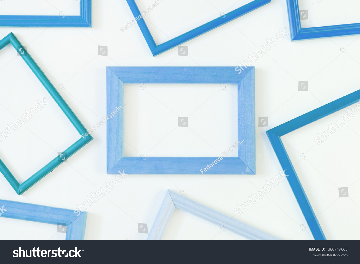 Blue empty frames laid out on a white background. Layout for the layout. Photo with space for text and images. #1380749663