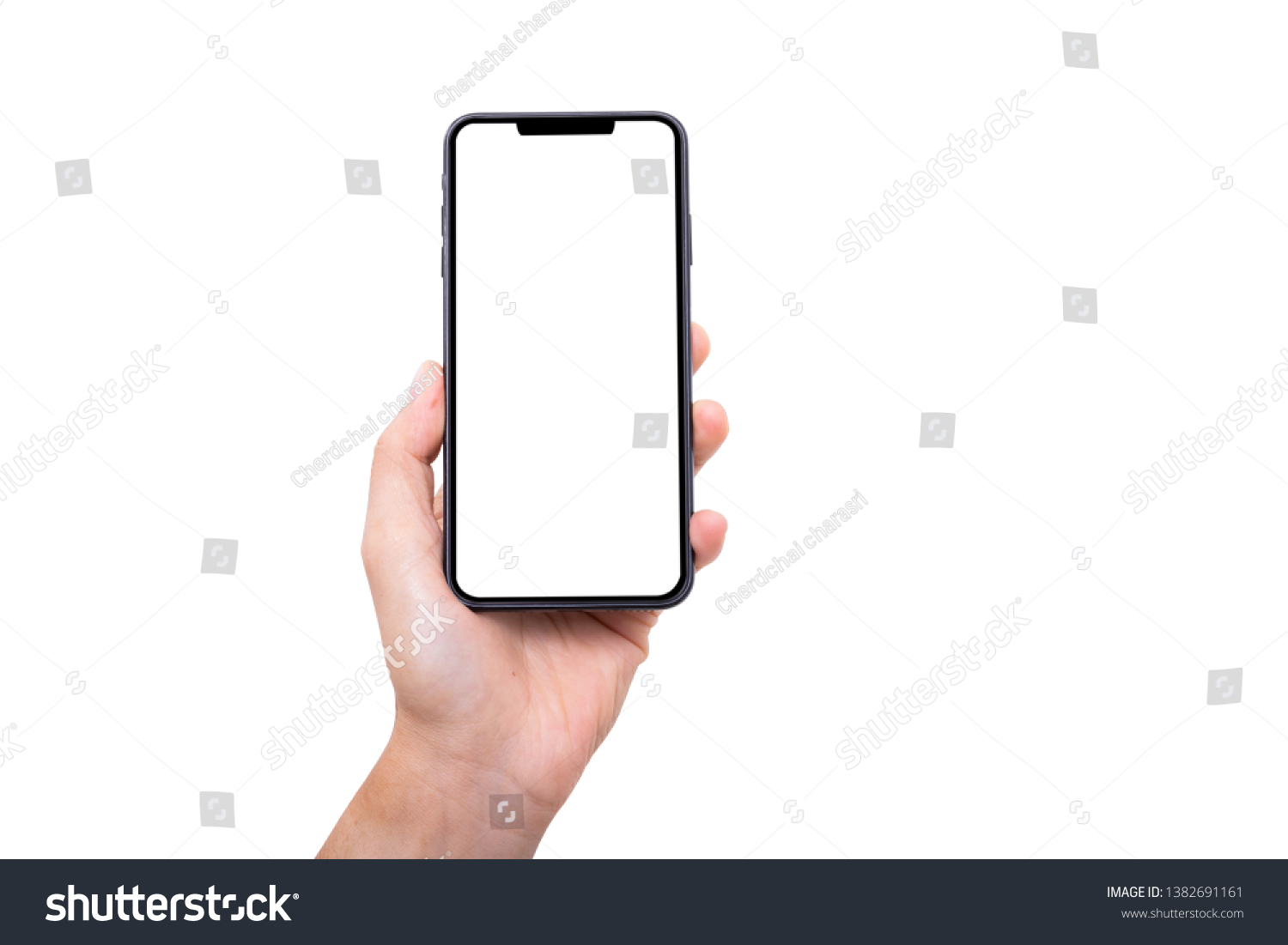 Hand holding new smartphone on white background #1382691161