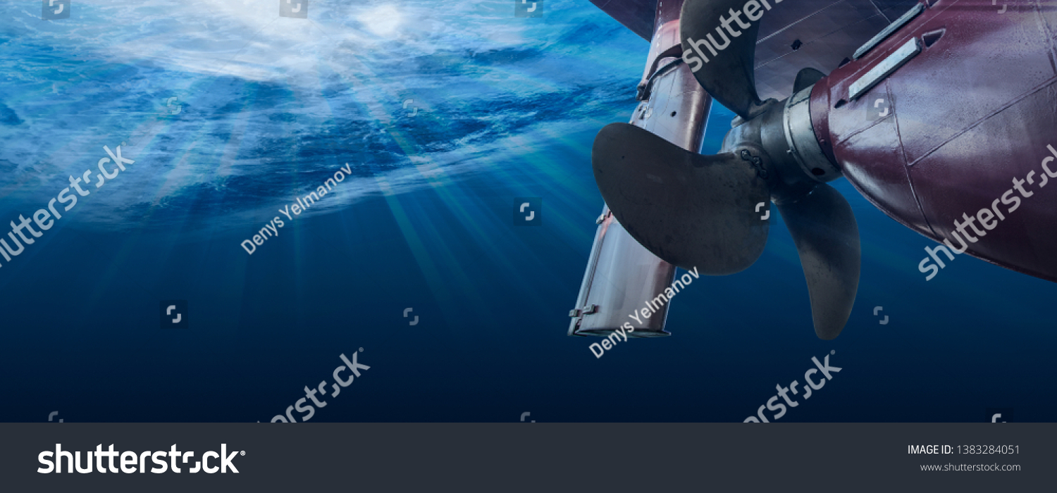 Propeller and rudder of big ship underway from underwater. Close up image detail of ship. Transportation industry. Freight transportation. Ship repair, underwater survey and shipping business concept #1383284051