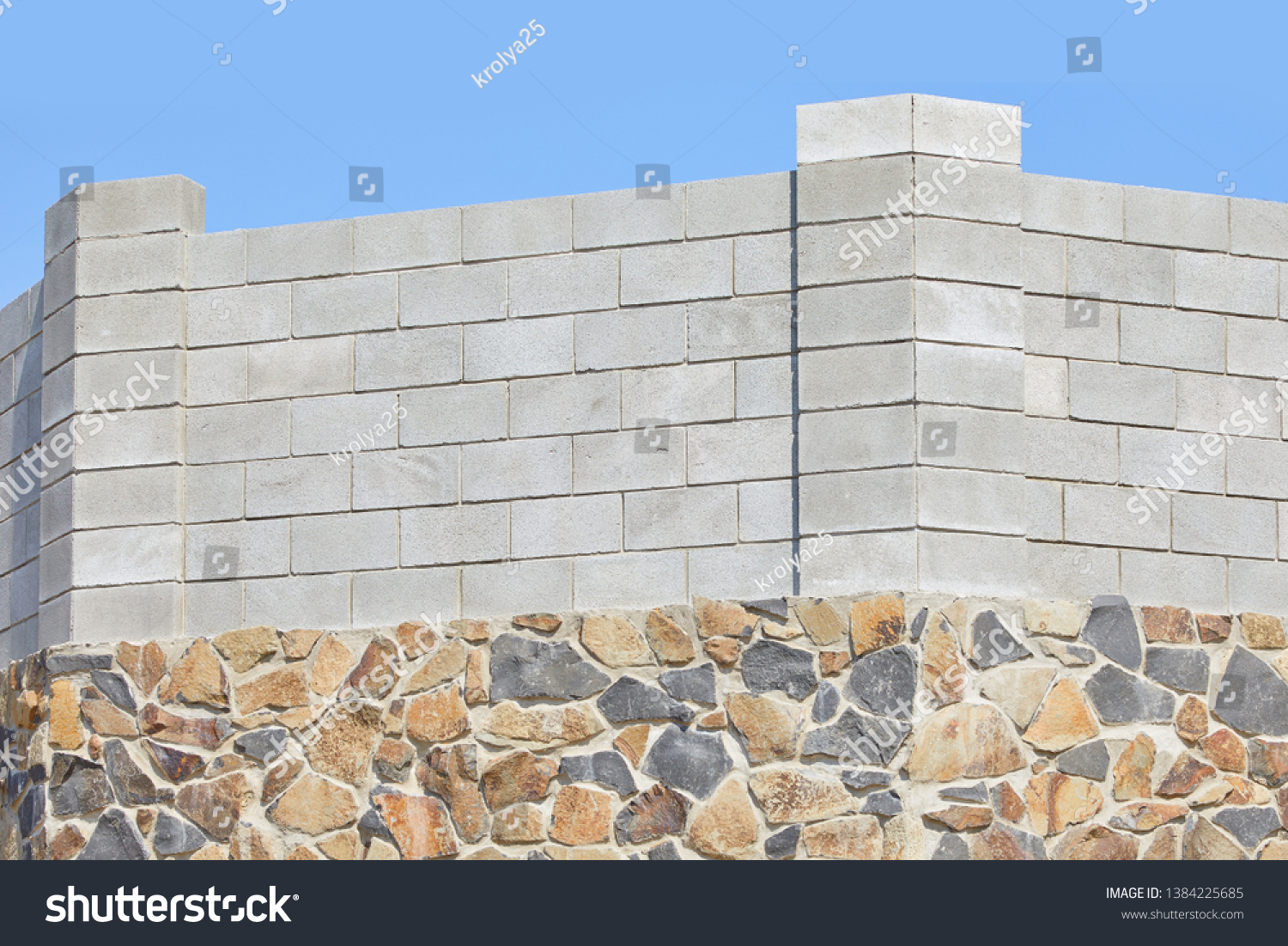 Concrete block bricks in stack for wall construction. Concrete block, cinder blocks, breeze blocks, hollow blocks, Besser blocks or Besser bricks wall background, brick texture #1384225685