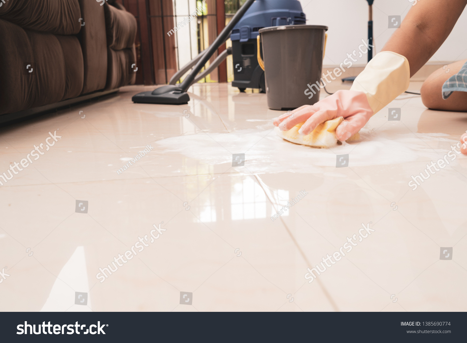 woman on cleaning the floor close up. #1385690774