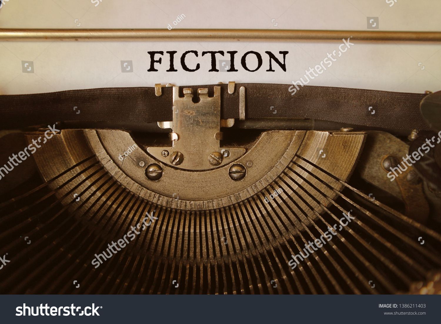 Word fiction is typed by an old typewriter on a paper. #1386211403