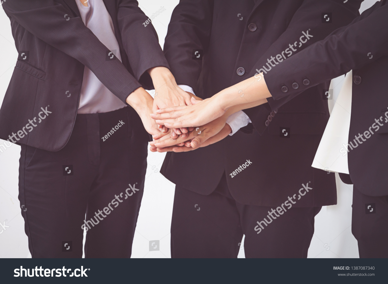 business people coordinate hands. Concept Teamwork #1387087340