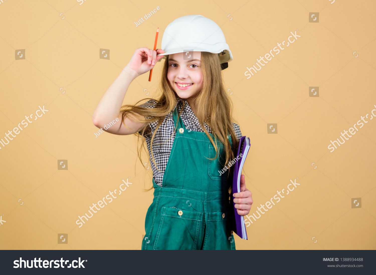 small girl repairing in workshop. Foreman inspector. Repair. Child care development. Safety expert. Future profession. Builder engineer architect. Kid worker in hard hat. This is my place #1388934488