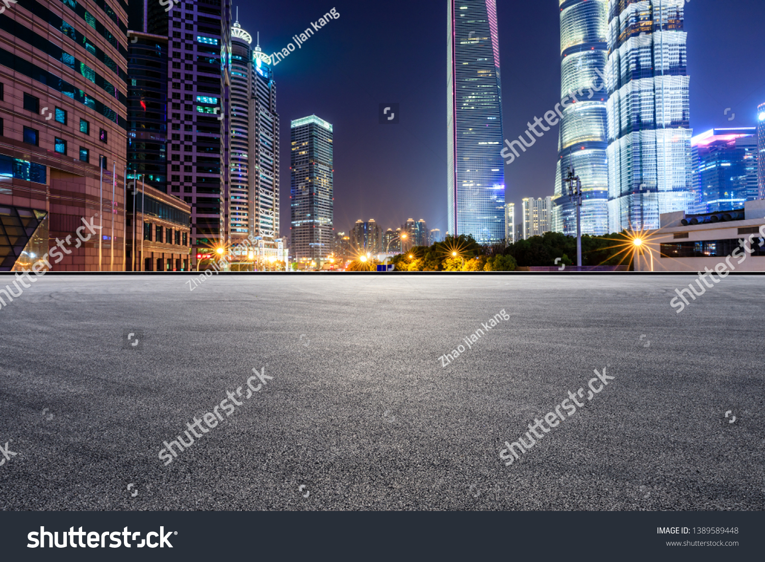 Asphalt race track and modern skyline and buildings in Shanghai at night #1389589448