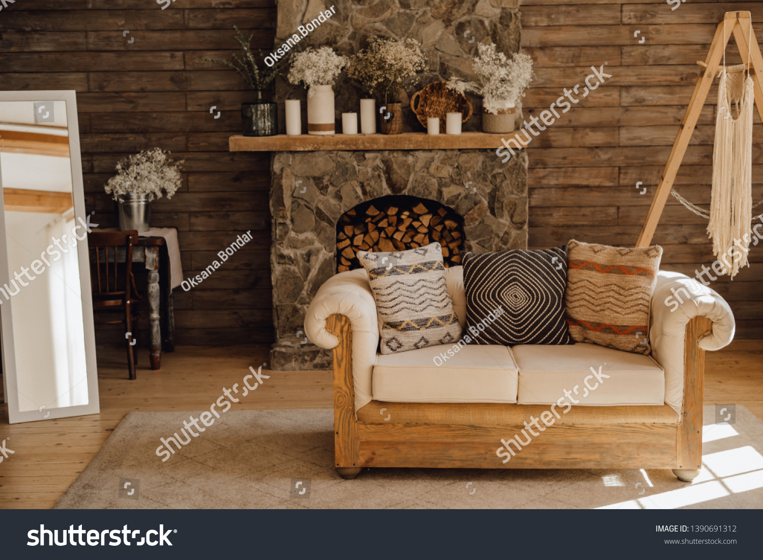 Chalet Cozy Interior Wooden Sofa and Fireplace. Rustic Home Design for Warm Indoor Space Alpine Vacation. Modern Cottage Living Room Decor with Wood Wall and Furniture. Winter Holiday Background #1390691312