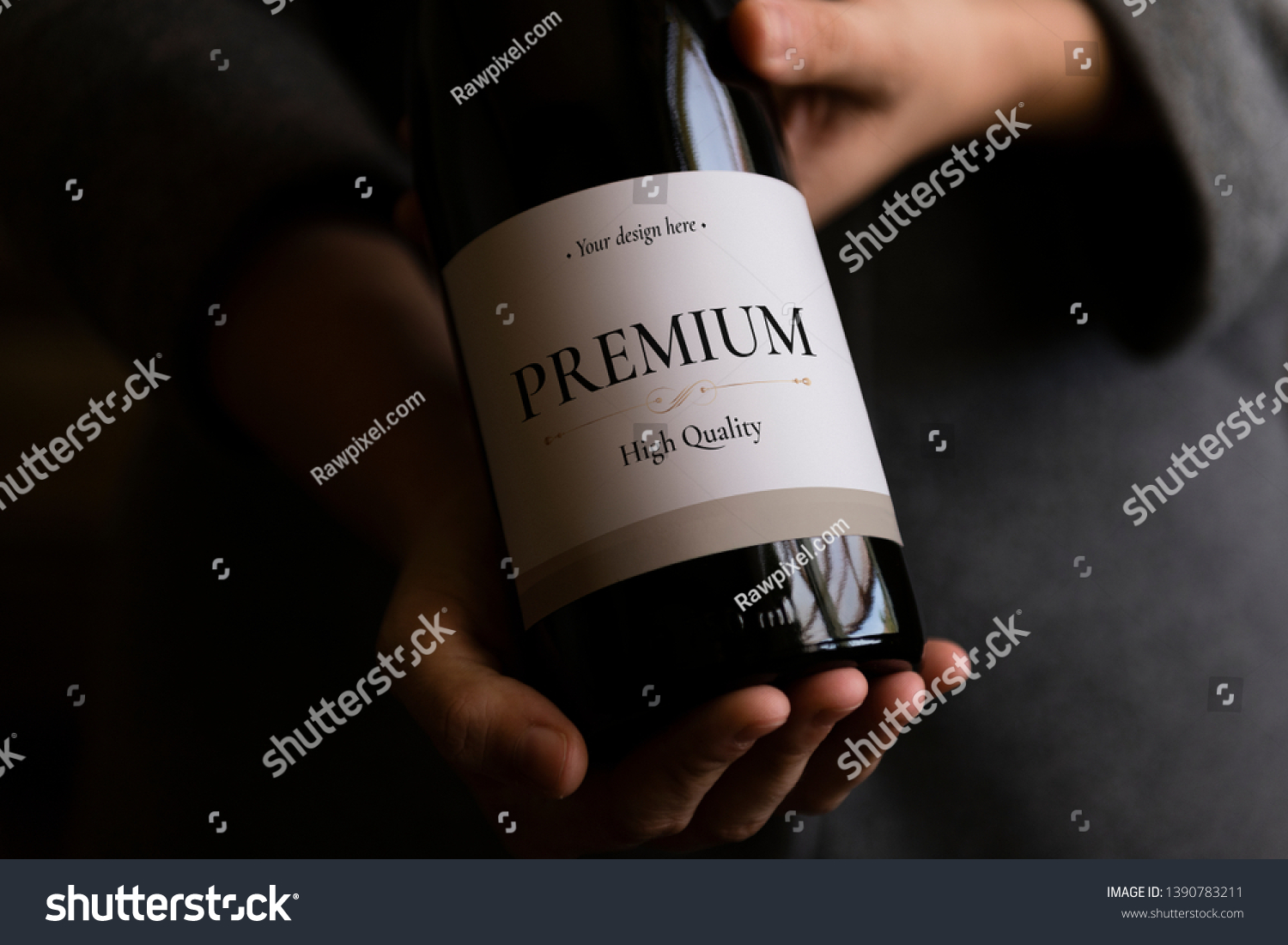 Woman holding a bottle of wine with a label mockup #1390783211