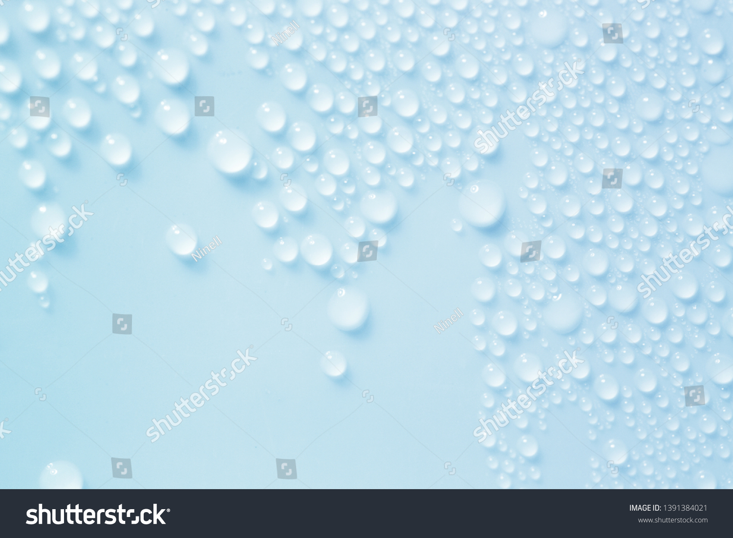 Water Drops. Bubbles close-up. The texture of gel cream. Oxygen bubbles in clear blue water, close-up. Mineral water. Water enriched with oxygen. #1391384021