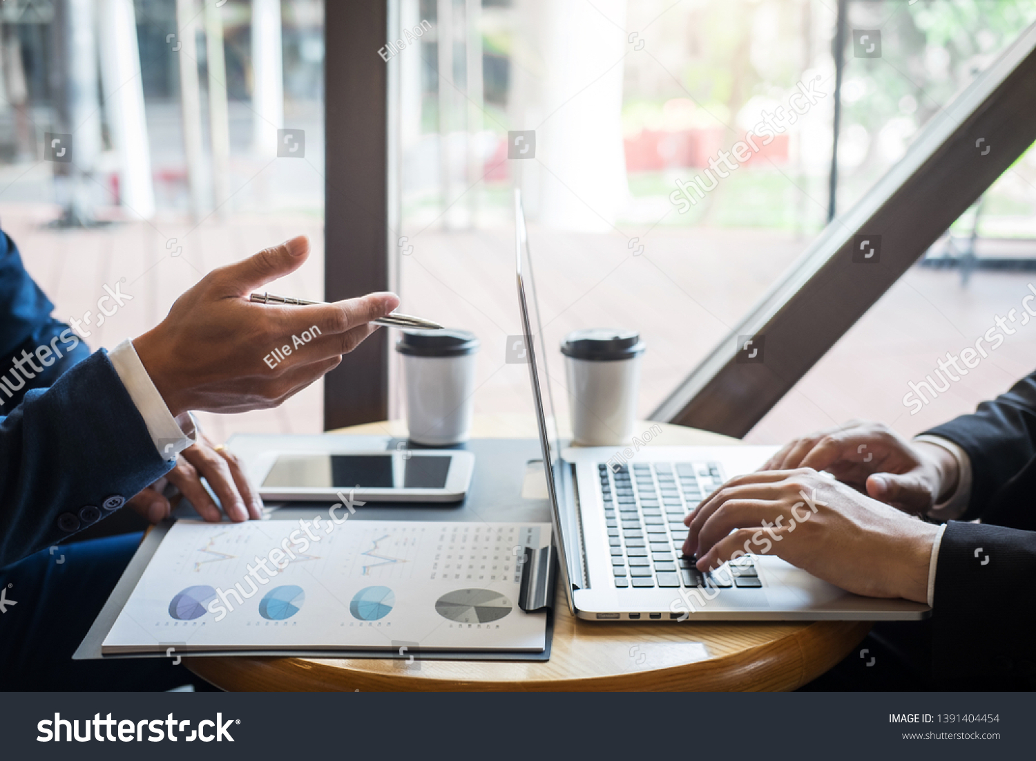 Professional Business partner team discussing on meeting to presentation planning investment project working analyzing and strategy of business making conversation with partner company. #1391404454