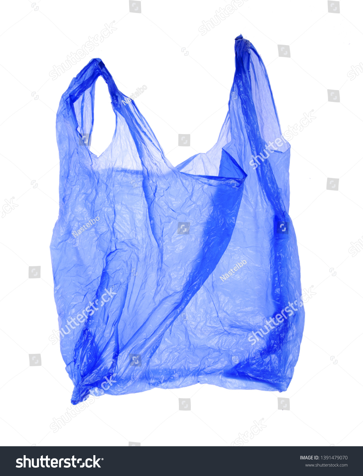 Blue plastic bag on white background. Isolated object #1391479070