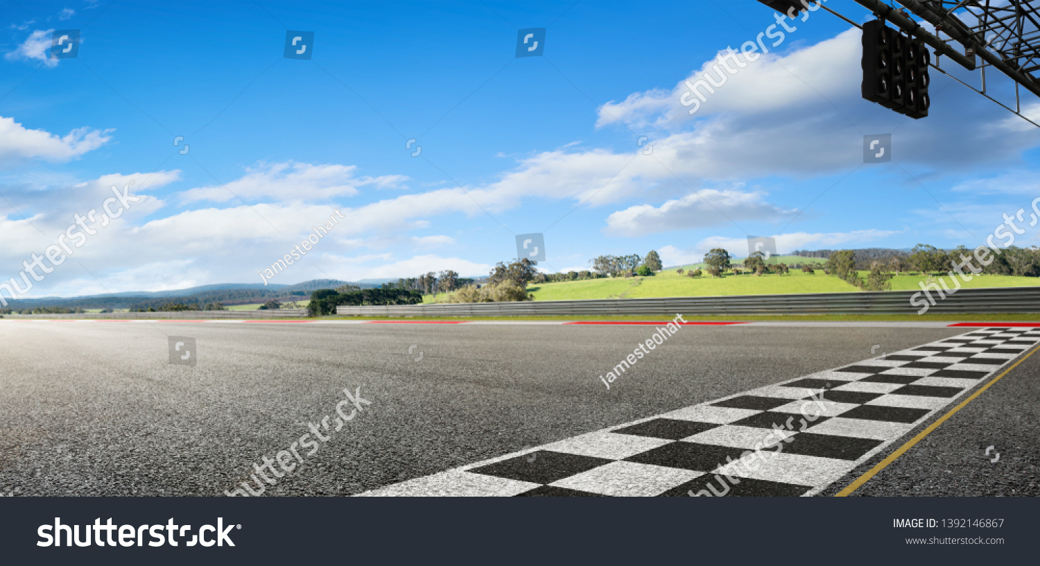 Wide angle view empty asphalt international race track with start and finish line , morning scene . #1392146867