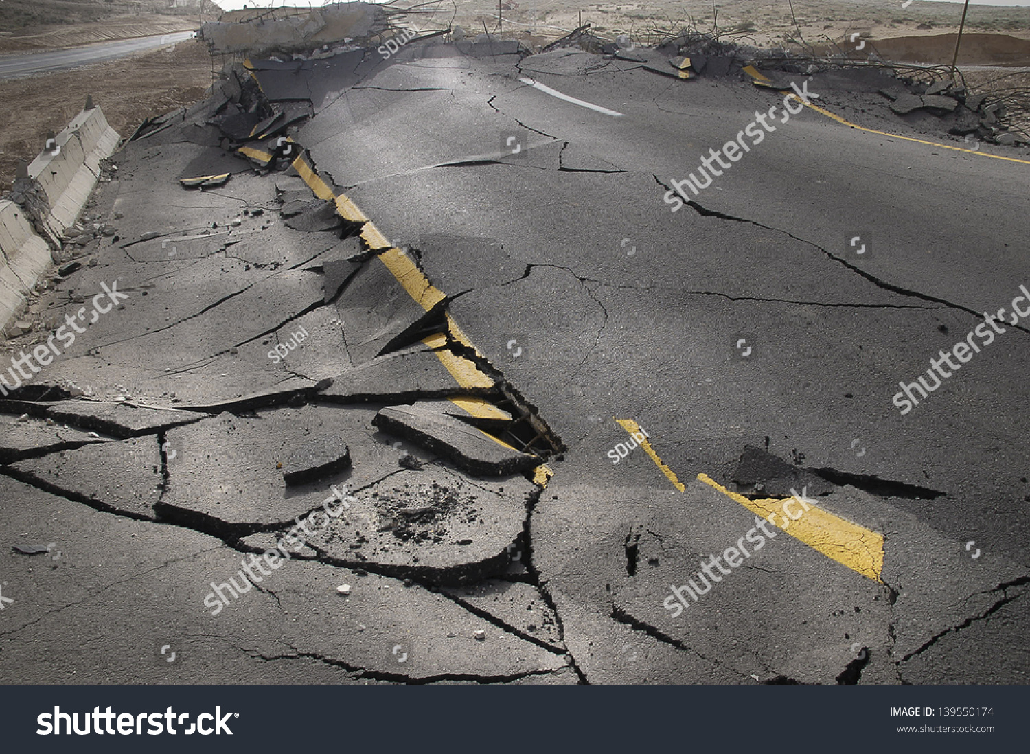 cracked asphalt after earthquake #139550174