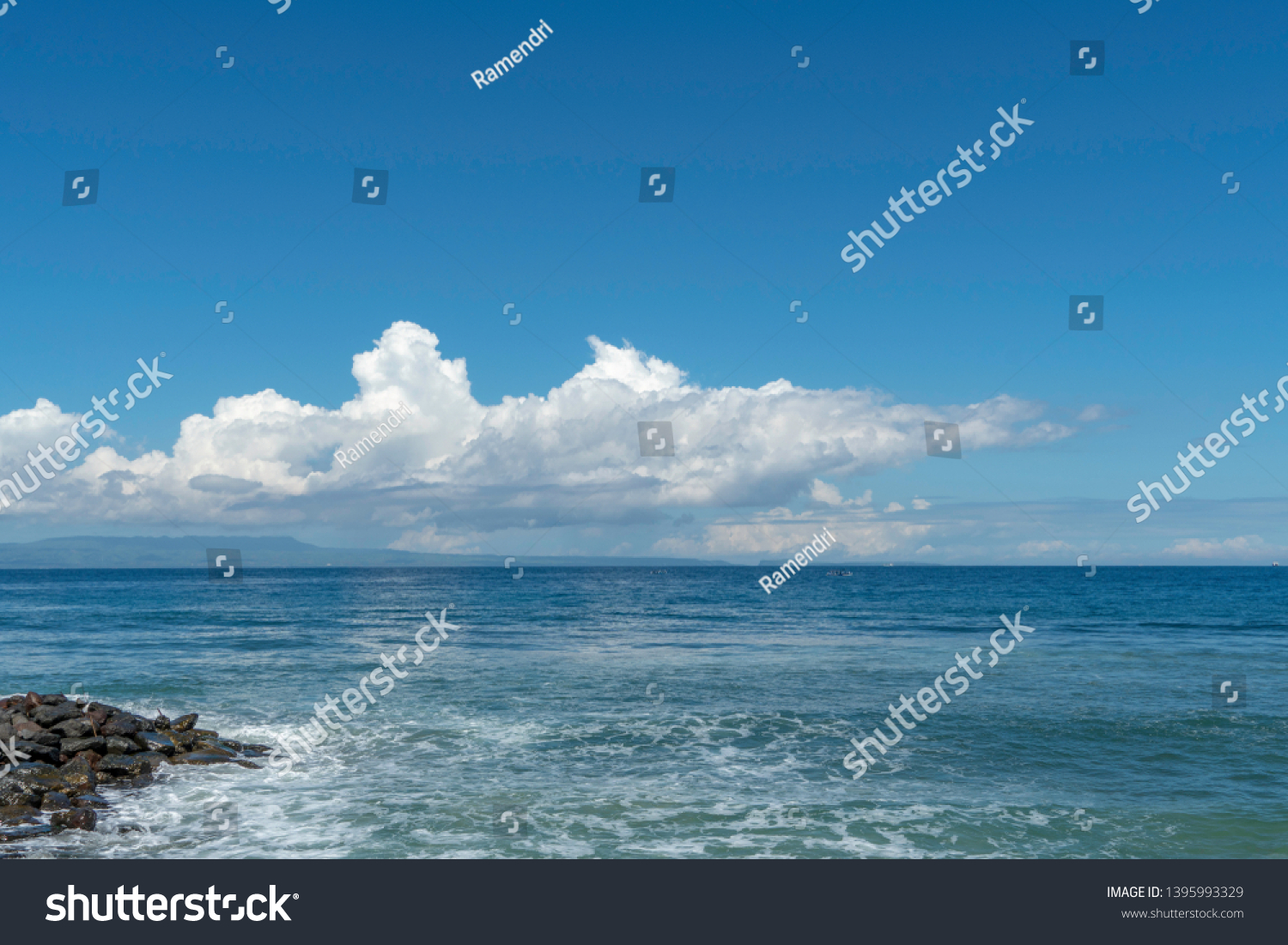 Blue sea with beautiful clouds in Candidasa Bali Indonesia #1395993329