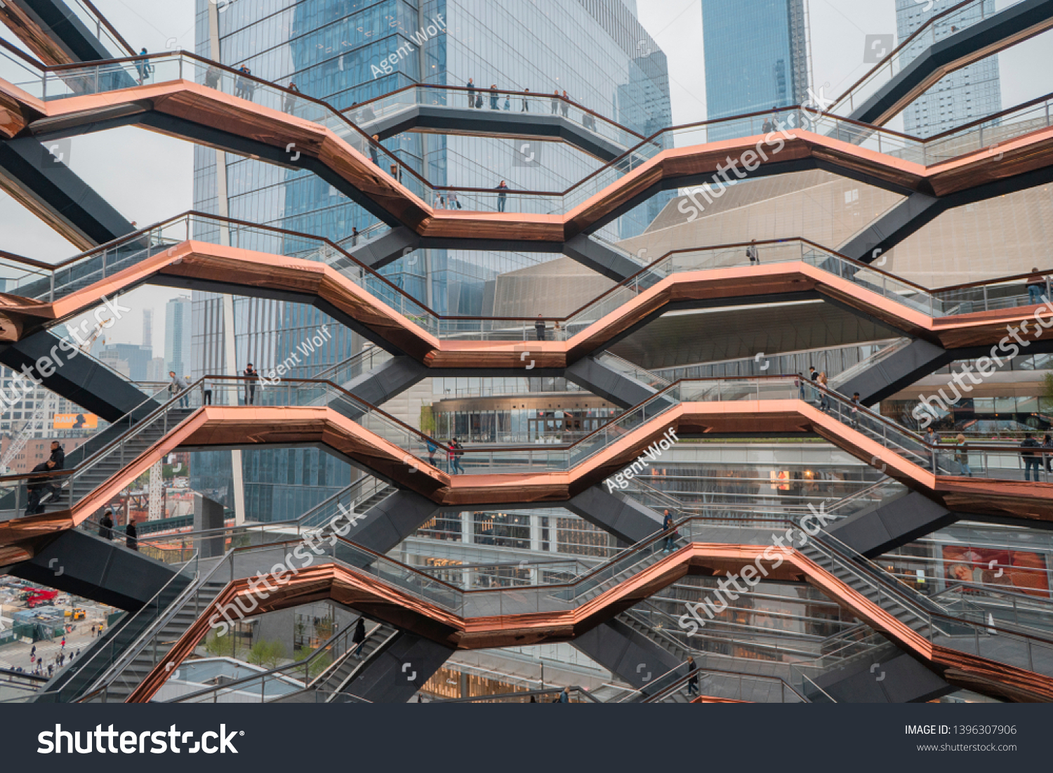 New York, USA - May 2, 2019: the Vessel is 154 intricately interconnecting flights of stairs inspired by the stepwells of India. It will be the centerpiece of the Hudson Yards. It is privately owned.  #1396307906