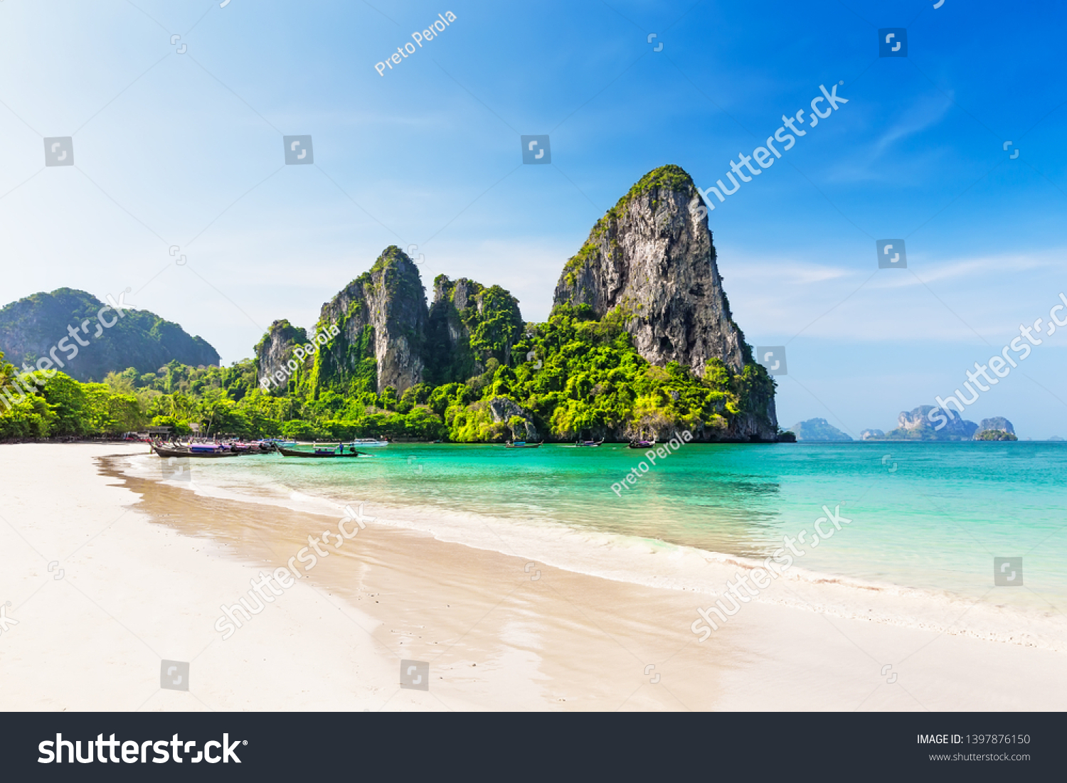 Thai traditional wooden longtail boat and beautiful sand Railay Beach in Krabi province. Ao Nang, Thailand. #1397876150