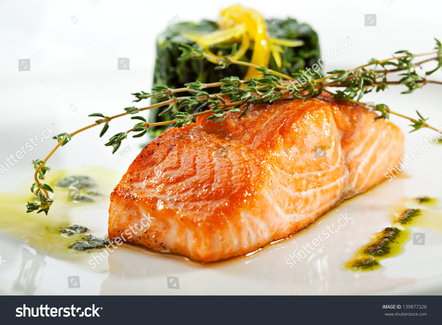 Baked Salmon Steak with Spinach and Lemon Slice #139877326
