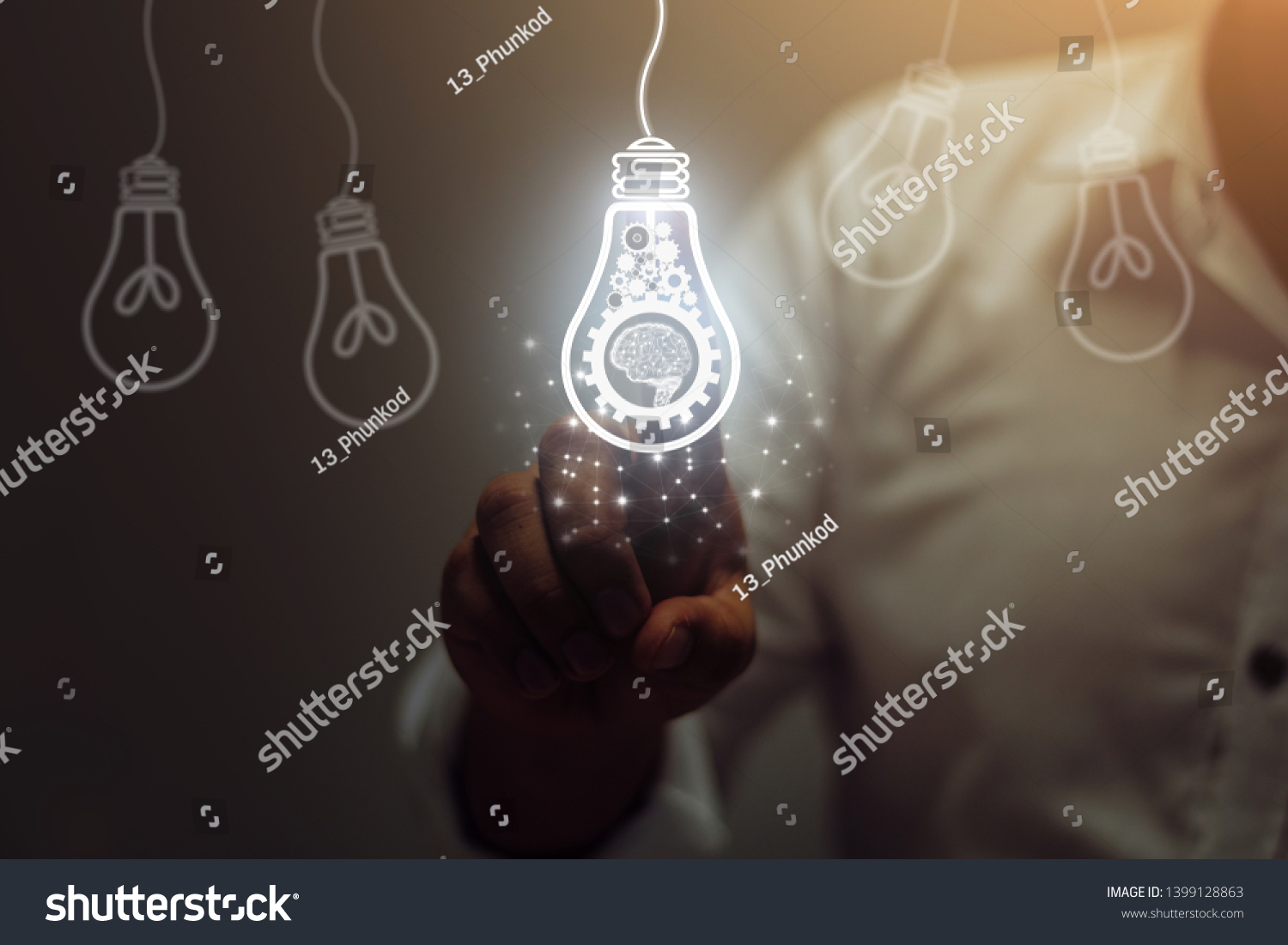 Businessman touching light bulbs. ideas of new ideas with innovative technology and creativity. #1399128863