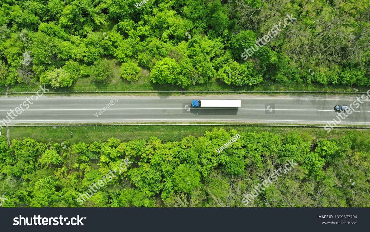Wagon driving on the highway, aerial. Transport logistics background top view.  #1399377794