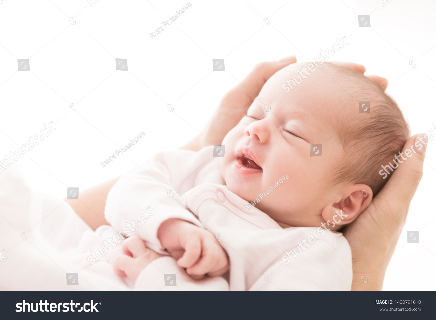 Newborn Baby Sleep on Mother Hands, New Born Girl Smiling and Sleeping, Happy Two Weeks Old Child on White #1400791610