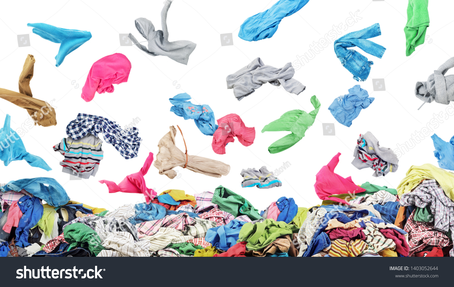 Separate clothing falling at the big pile of clothes on a white background #1403052644