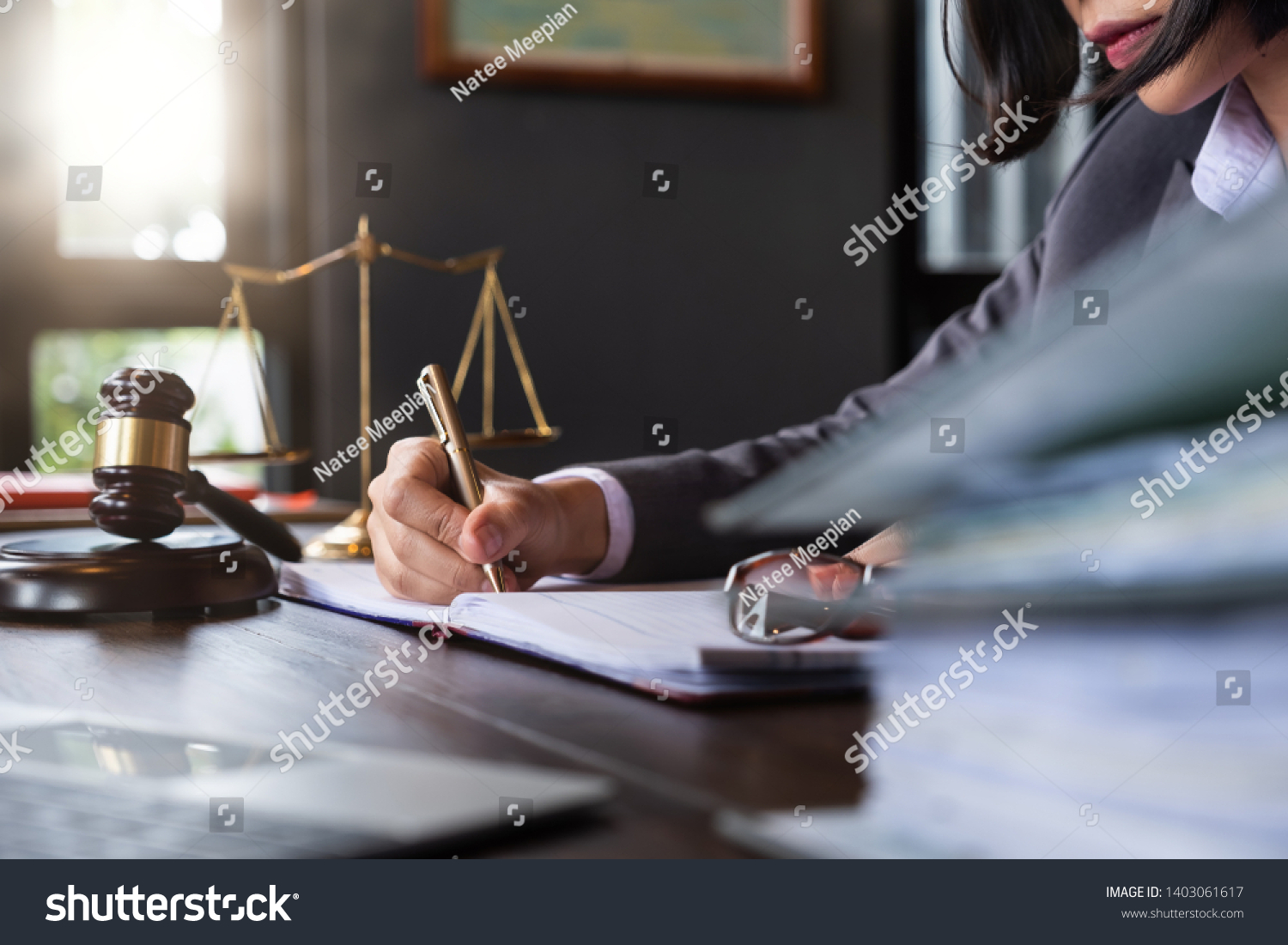 Judge gavel with Justice lawyers, Business woam in suit or lawyer working on a documents. Legal law, advice and justice concept. #1403061617