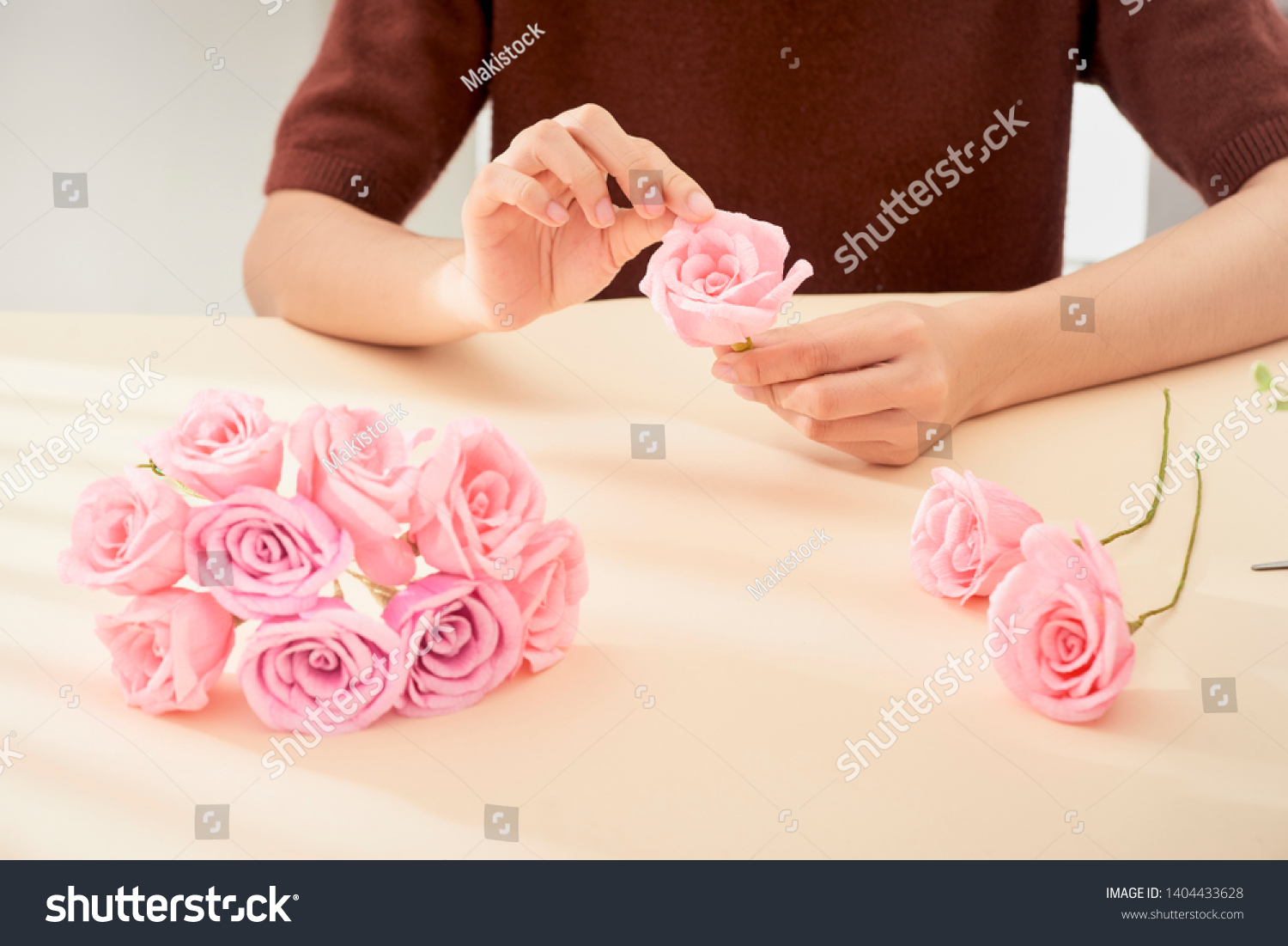 People making paper craft flower art  #1404433628