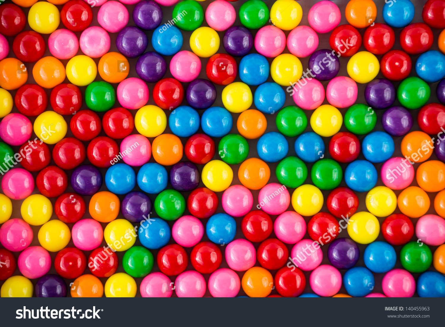 Brightly colored gum balls laying flat, background #140455963