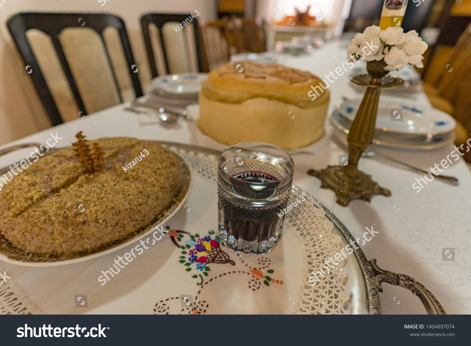 Wine, boiled wheat and domestic bread put on the table as a part of a Christian tradition #1404897074