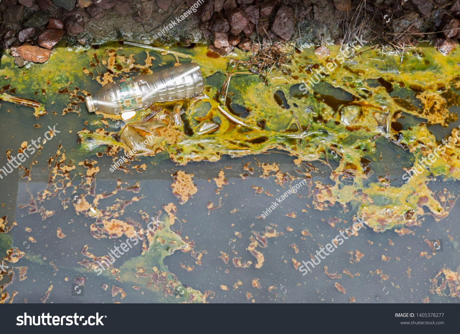 Water pollution in Thailand, dirty water, garbage and oil floating on dirty water #1405378277