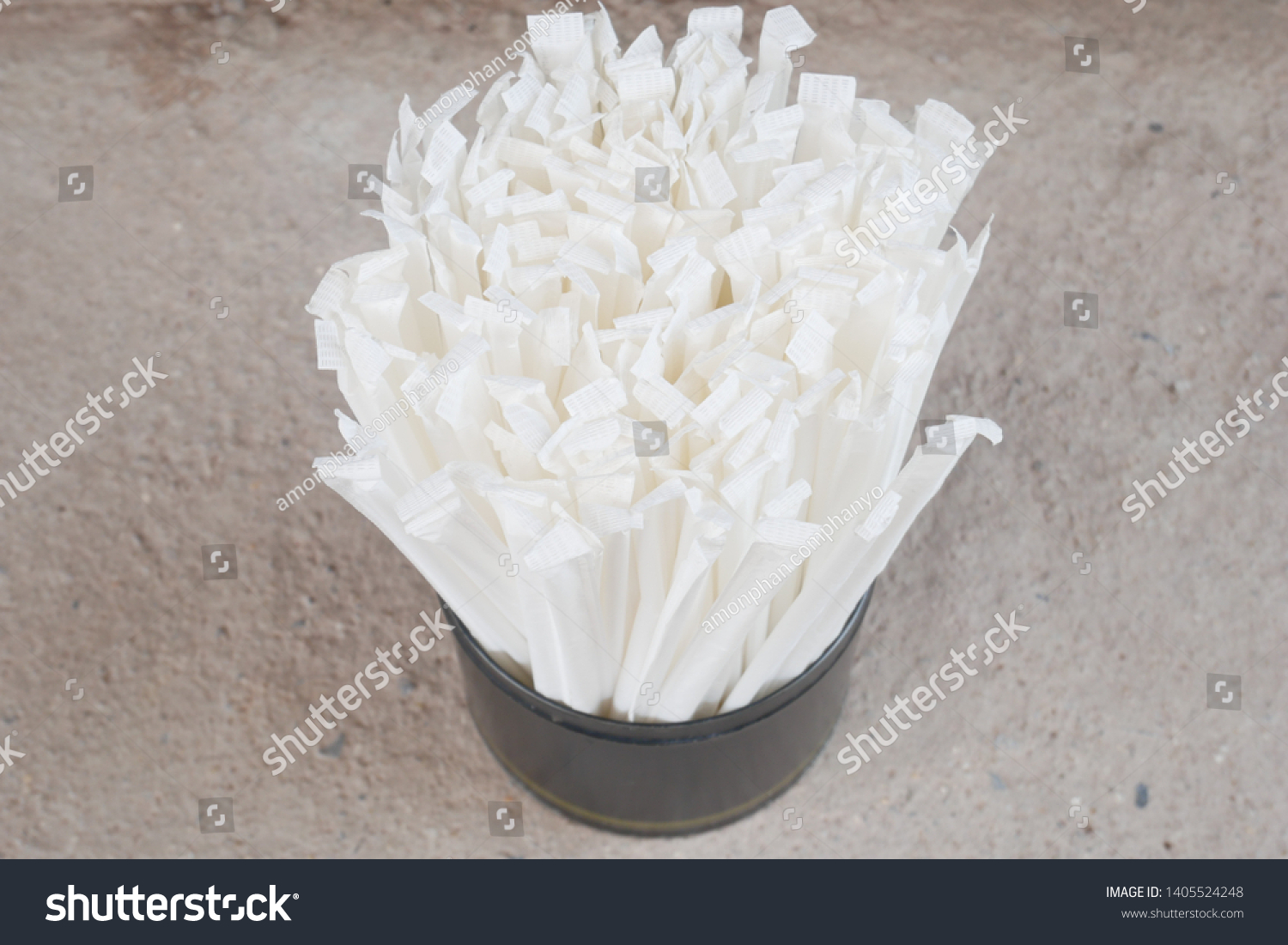 A bundle of wet dewy plastic drinking straws, white drinking straws packing #1405524248