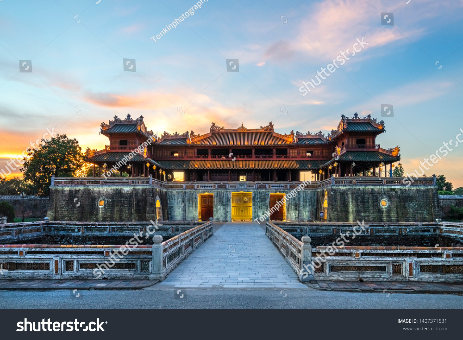 Wonderful view of the “ Meridian Gate Hue “ to the Imperial City with the Purple Forbidden City within the Citadel in Hue, Vietnam. Imperial Royal Palace of Nguyen dynasty in Hue. Hue is a popular 
 #1407371531