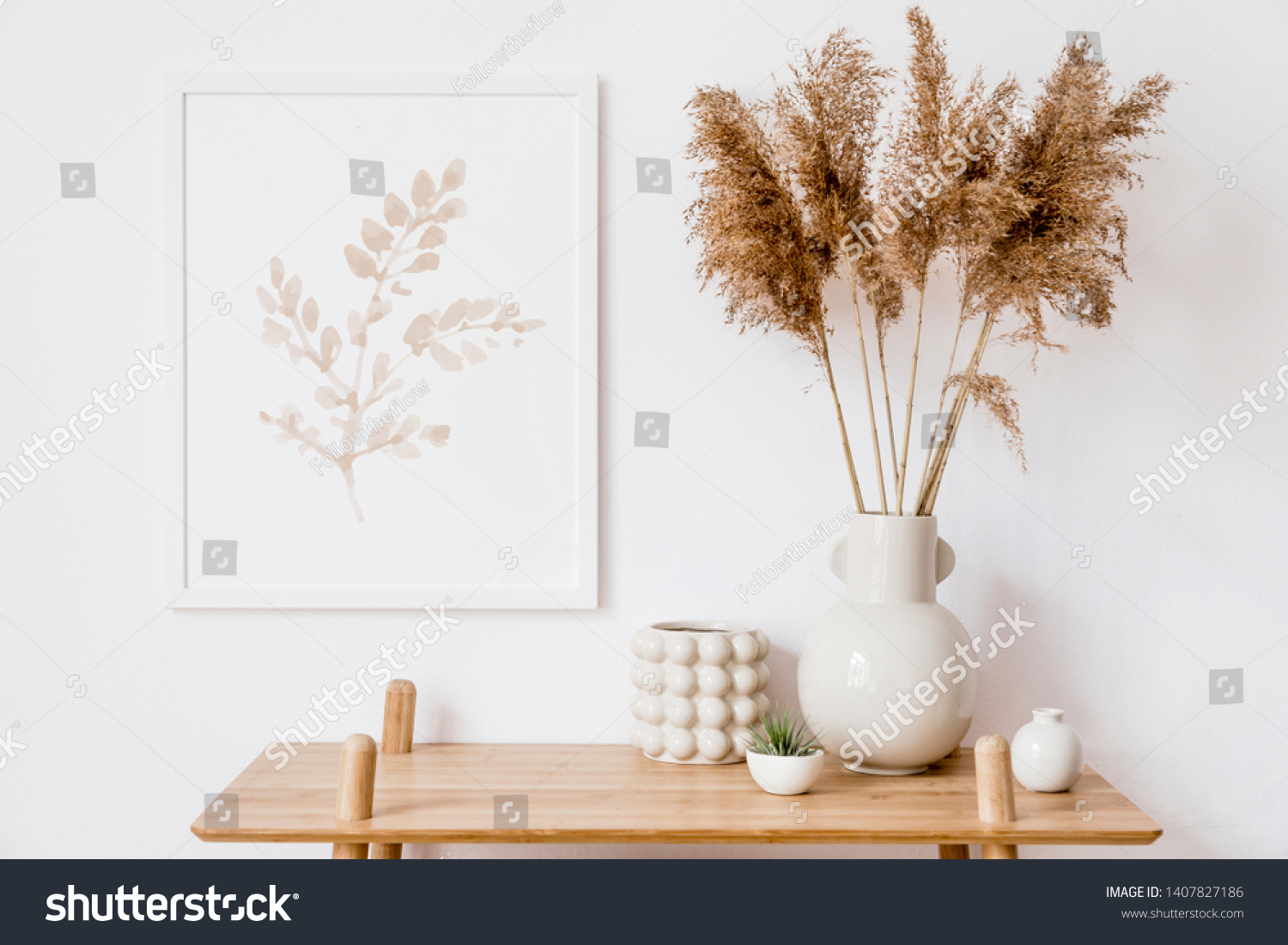 Stylish korean interior of living room with white mock up poster frame, elegant accessories, air plant, wooden shelf and vase with flowers. Minimalistic concept of home decor. Template. Bright room. #1407827186