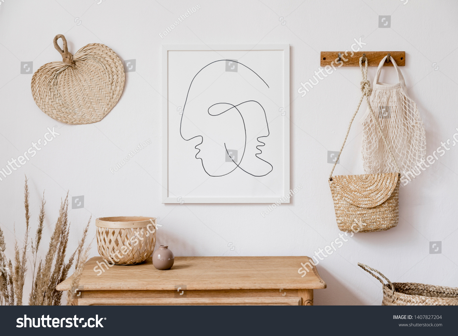 Stylish korean interior of living room with white mock up poster frame, elegant accessories, flowers in vase, wooden shelf and hanging rattan leaf, bags. Minimalistic concept of home decor. Template.  #1407827204